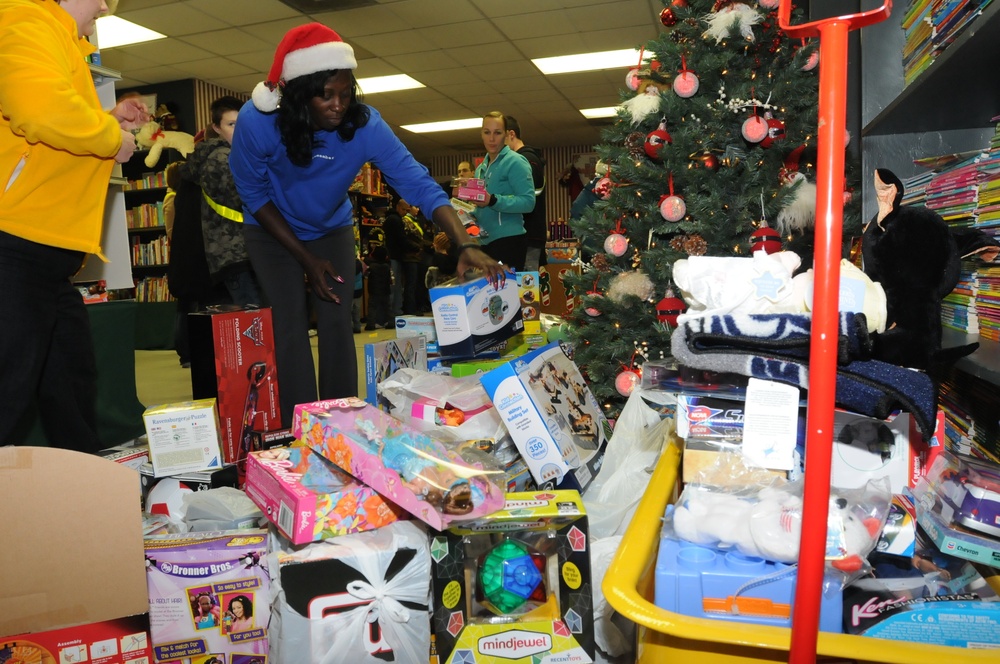 Soldiers take care of soldiers by donating more than $2,800 worth of toys