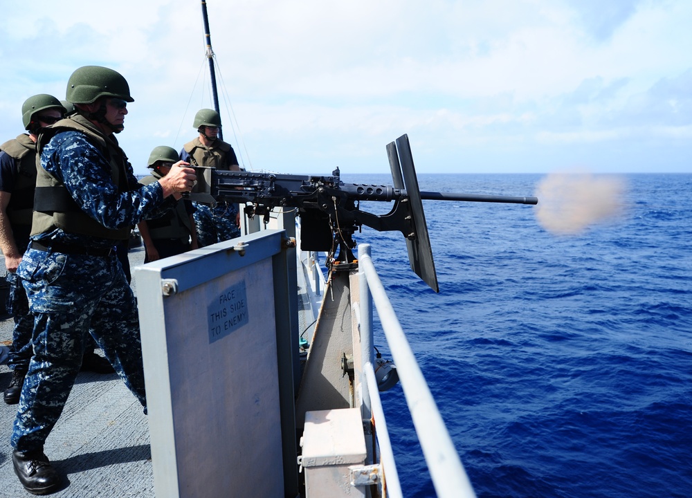 Tortuga sailor fires machine gun