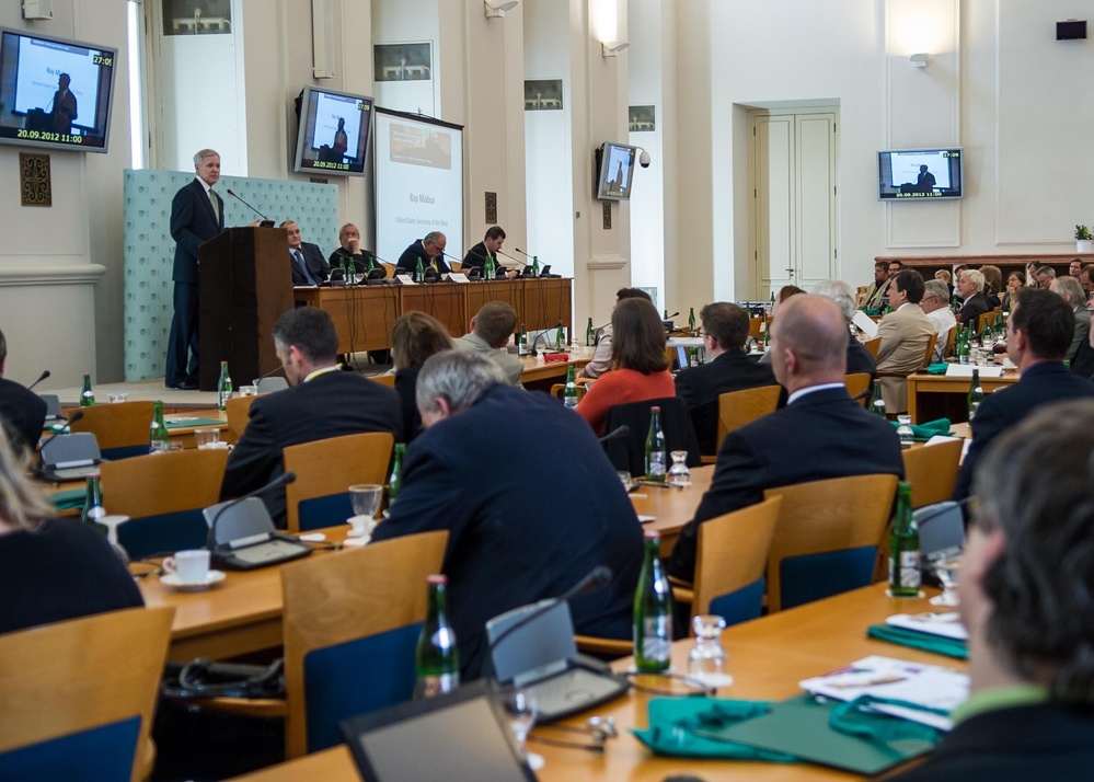 Secretary of the Navy Ray Mabus, speaks with US Ambassador