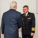 Secretary of the Navy Ray Mabus, speaks with US Ambassador