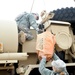 Soldiers prepare for fuel truck for departure to New Jersey
