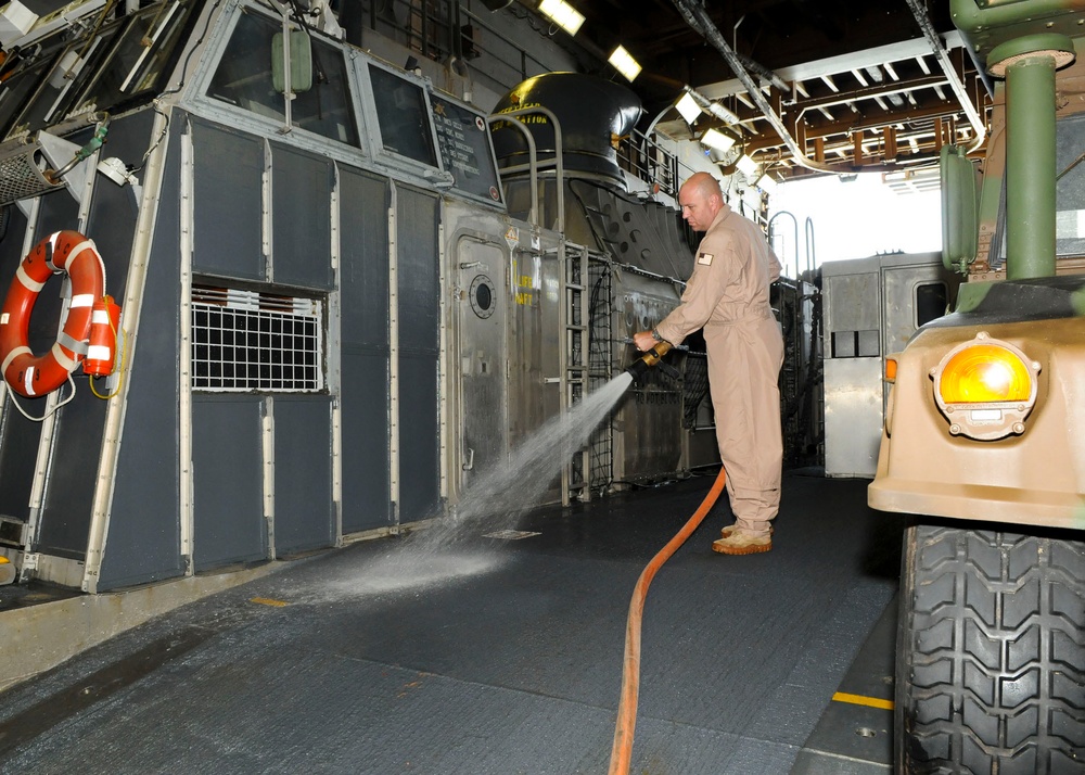 Washing the deck