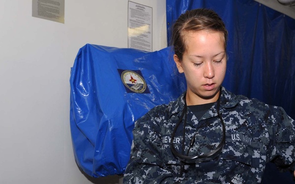 USS George H.W. Bush sailors at work