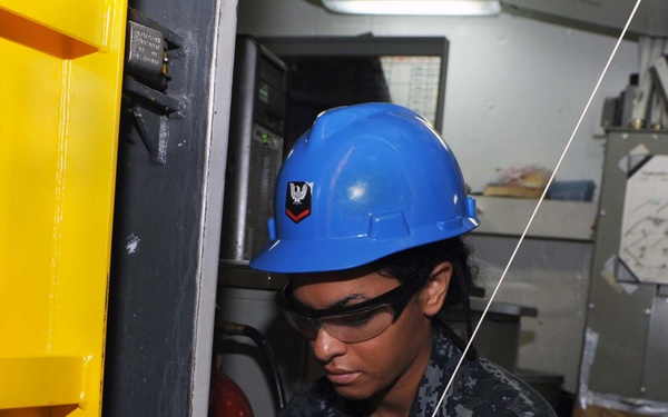 USS George H.W. Bush sailors at work
