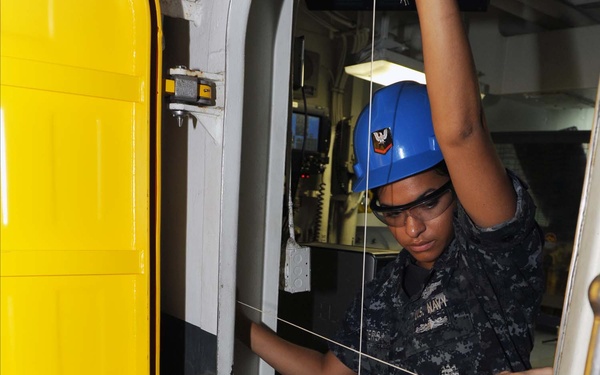 USS George H.W. Bush sailors at work