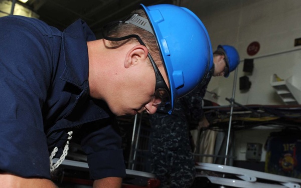 USS George H.W. Bush sailors at work