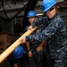 USS George H.W. Bush sailors at work