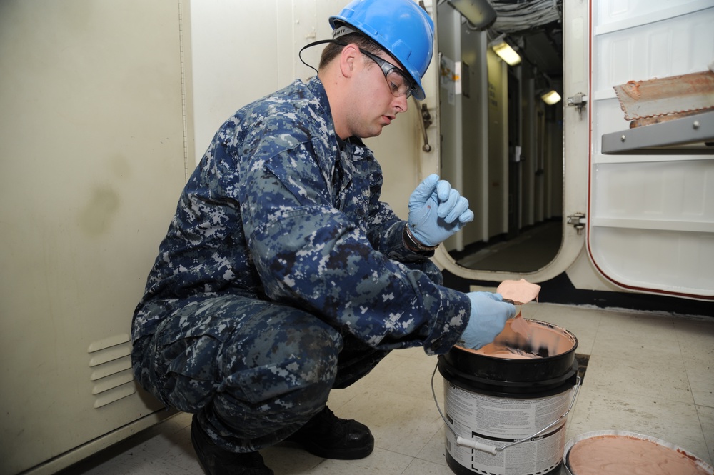 USS George H.W. Bush sailors at work