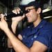 USS Farragut sailor inspects cable