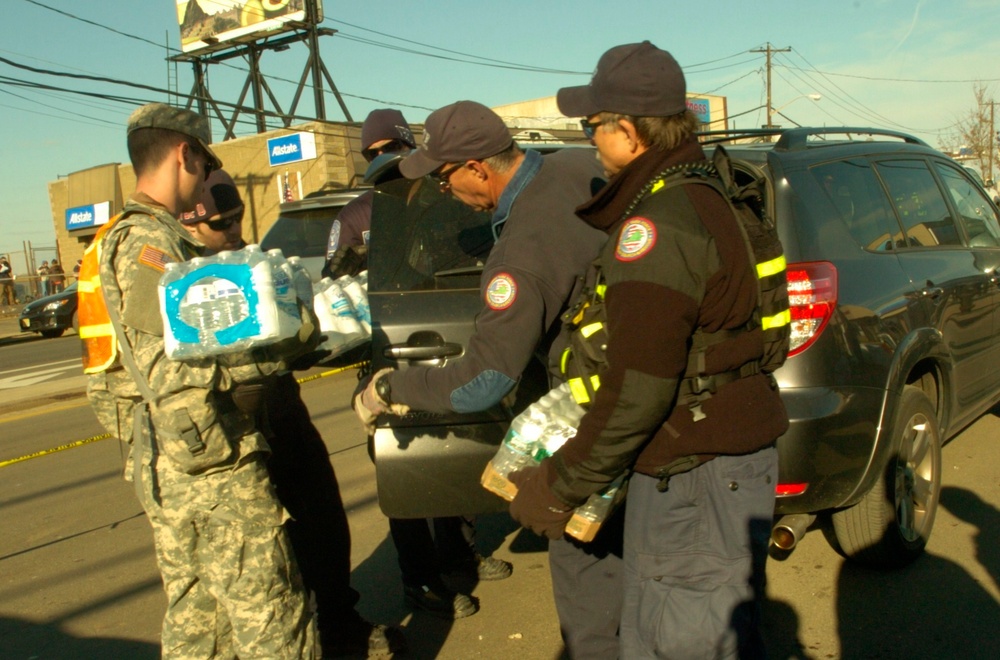 New York National Guard distribute food to New Yorkers following Hurricane Sandy