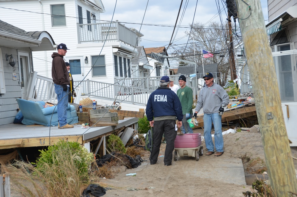 FEMA community relations worker canvases New York area affected by sub-tropical storm Sandy