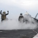 USS George Washington sailors direct aircraft