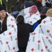 Displaced Civilians Await Aid at Distribution Center.