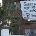 Sign Hangs from Long Beach Home