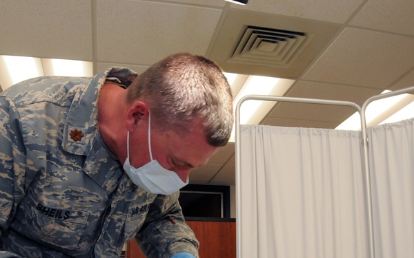 Smiles get brighter at 184th Intelligence Wing