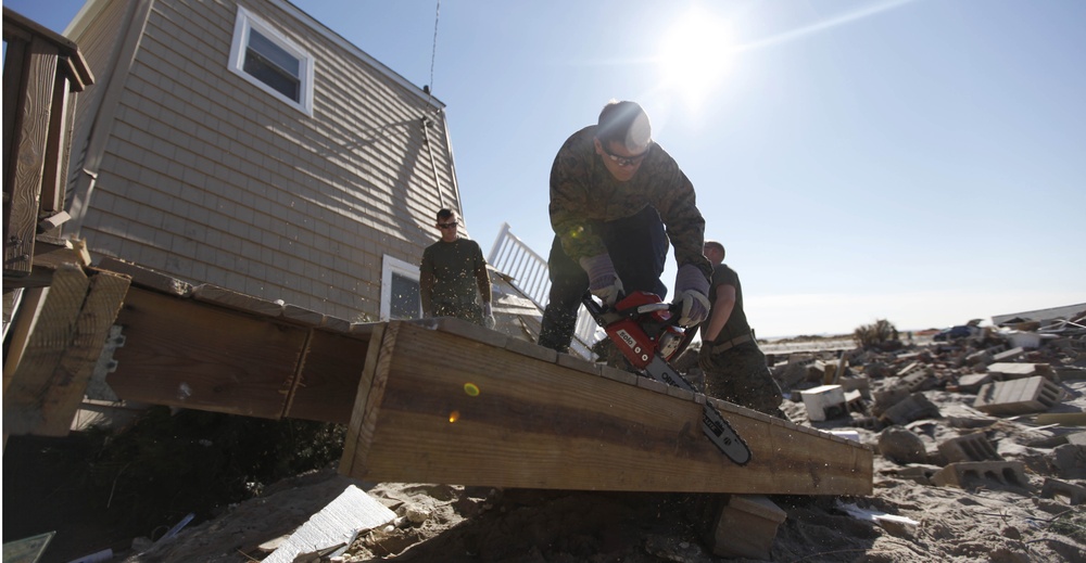 Marines move debris for residents