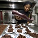 USS Harry S. Truman sailor prepares dessert