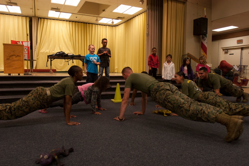 Marines conduct physical fitness challenge for students