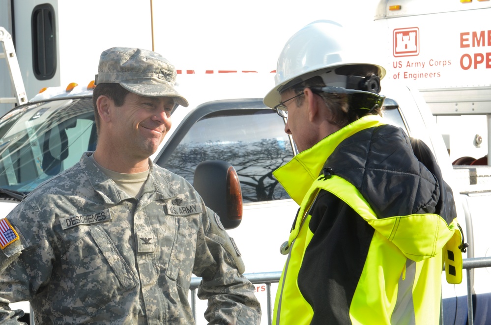 Task Force Unwatering deputy commander interacts with safety officer