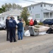 FEMA Community Relations workers go door to door in storm ravaged Rockaway, New York area of  Breezy Point