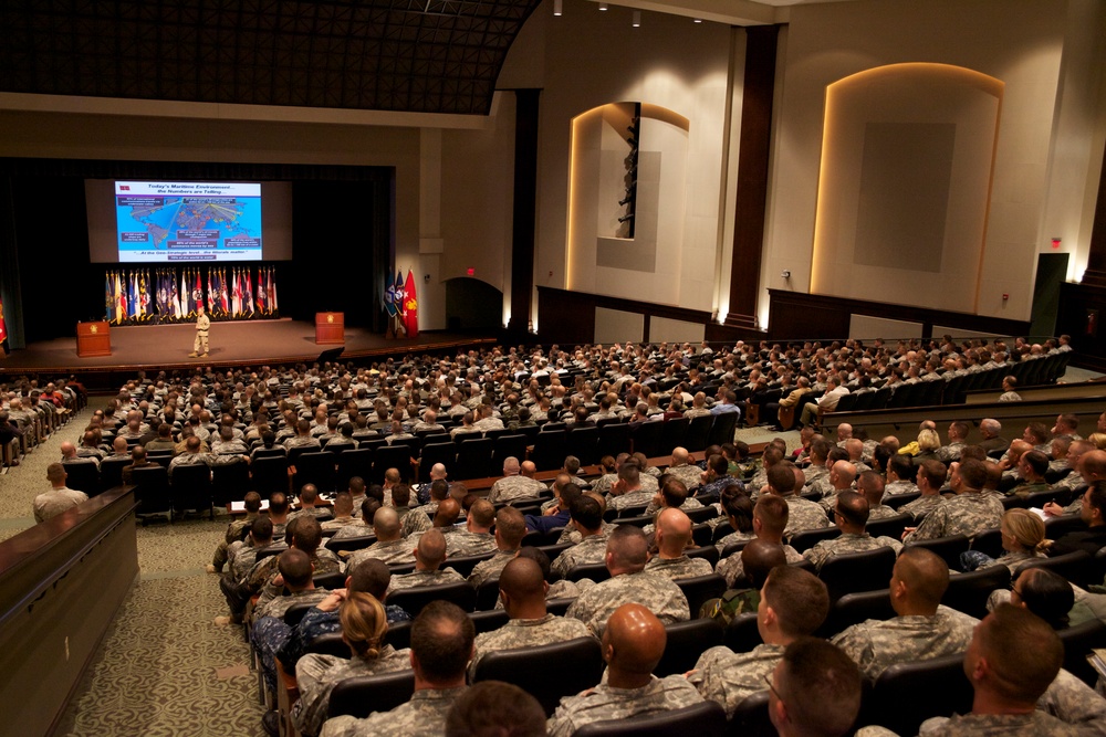 Commandant of the Marine Corps, Gen. James F. Amos speaks to students