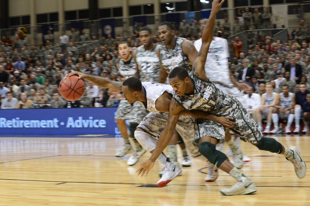 Huskies edge out Spartans 66-62 in Armed Forces Classic