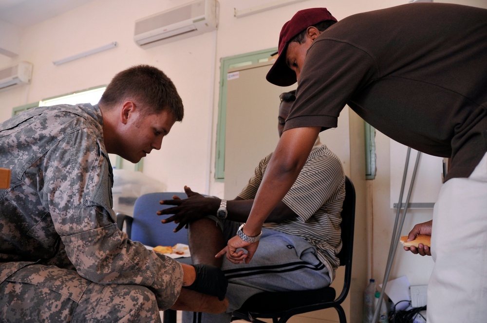 Medic treats local Djiboutian