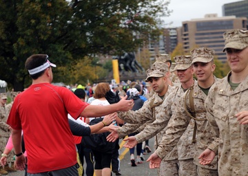 New leaders of the Marine Corps ends marathon with cheers
