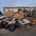 Residents of Midland Beach on Staten Island rid homes of water-soaked furniture