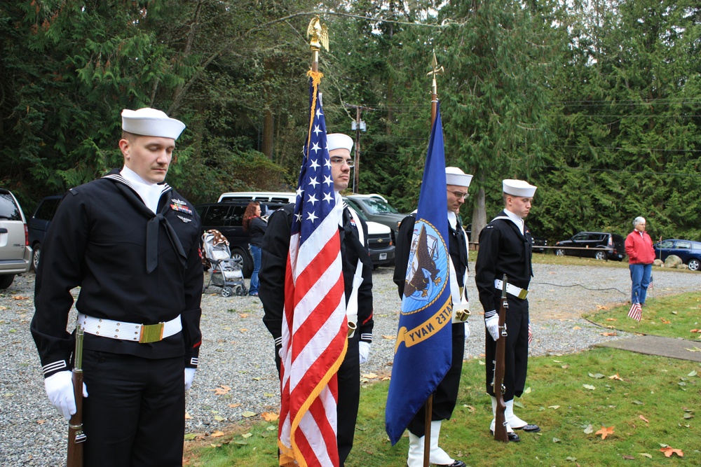 CBMU 303 Color Guard participates in a Veteran's Day service in honor of Medal of Honor recipient CM3 Marvin G. Shields