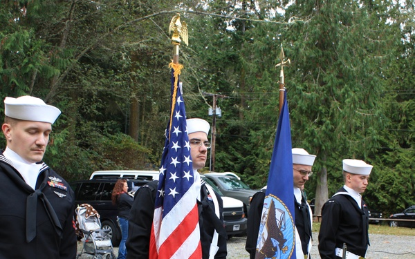 CBMU 303 Color Guard participates in a Veteran's Day service in honor of Medal of Honor recipient CM3 Marvin G. Shields