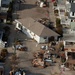 Aerial view of a home washed off of its foundation by Hurricane Sandy in Breezy Point, NY