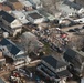 Aerial view of debris piled up outside of homes in Breezy Point, NY