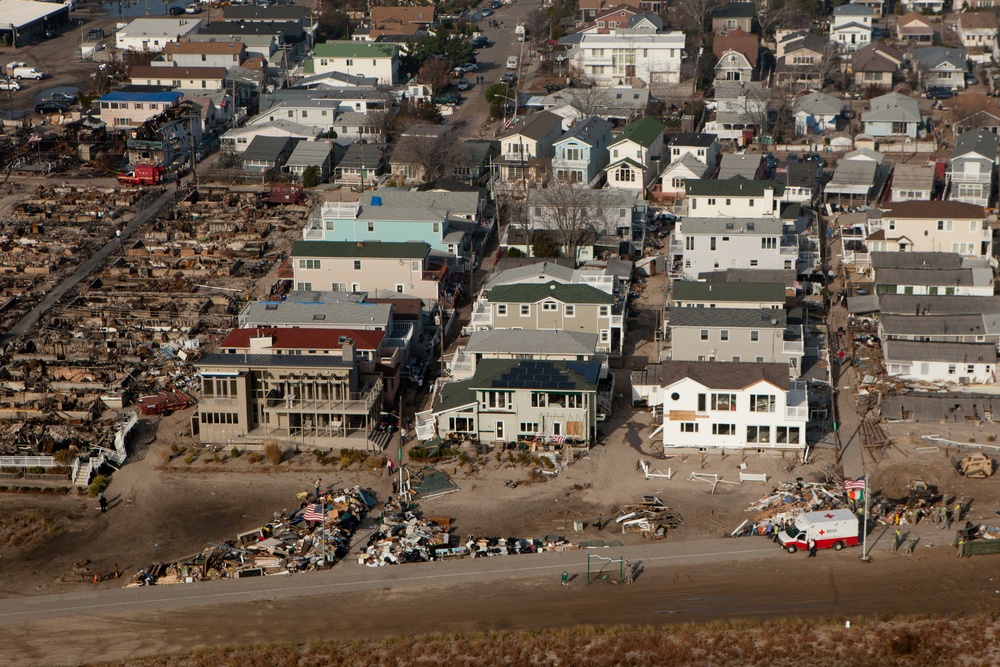 Aerial view of homes in the Breezy Point community that were ravaged by fires and flooding