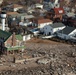Aerial view of homes in the Breezy Point community that were ravaged by fires and flooding
