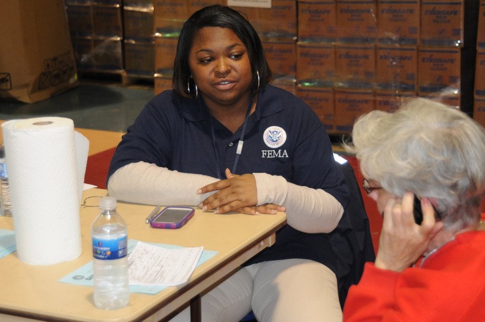 FEMA assisting survivor at distribution center
