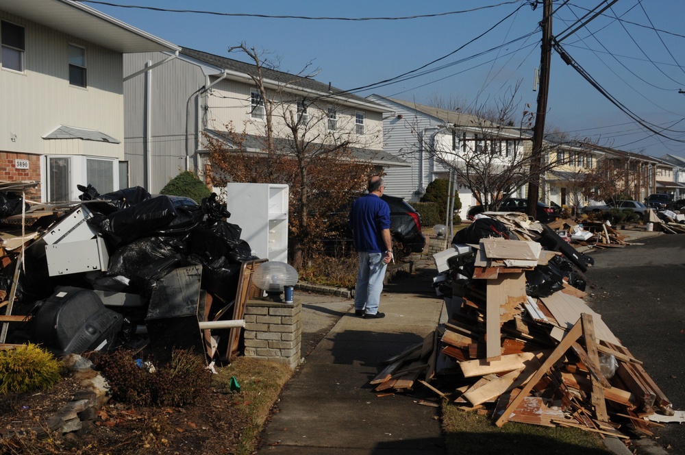Survivor with destroyed possessions