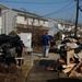Survivor with destroyed possessions