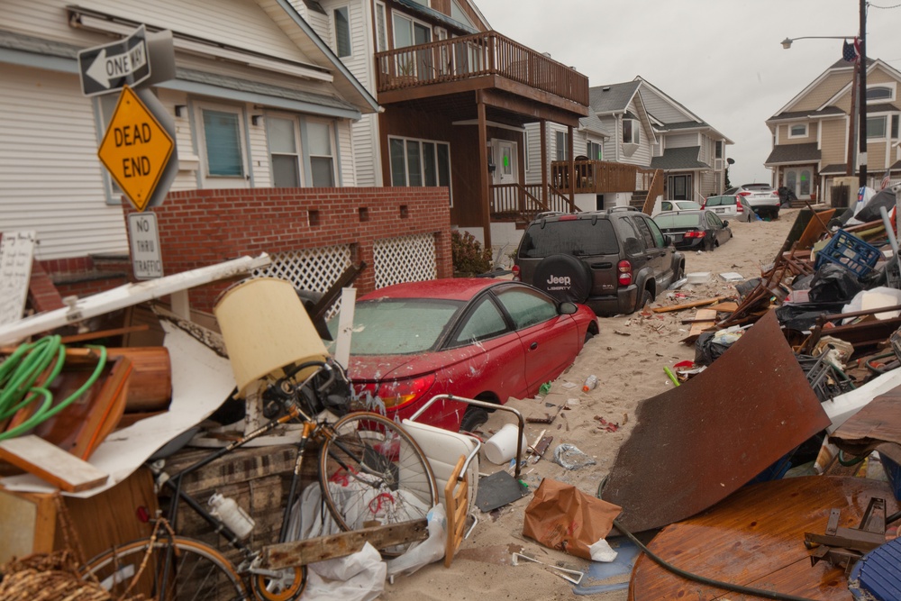 Debris piled up outside of homes in Long Beach, NY