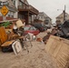 Debris piled up outside of homes in Long Beach, NY