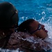Marines tread through water instructor survival training