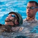 Marines tread through water instructor survival training