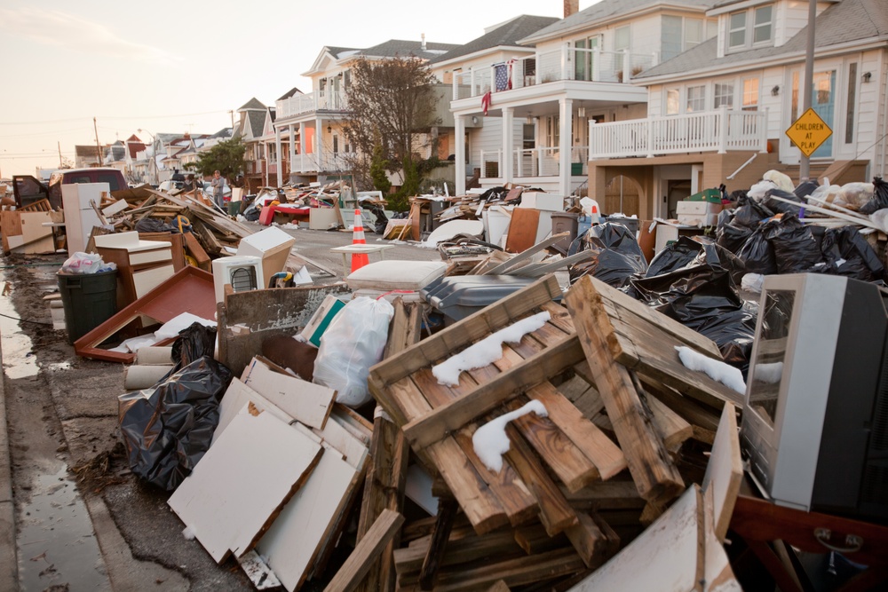 Debris piled up outside of homes in Long Beach, New York.