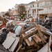 Debris piled up outside of homes in Long Beach, New York.