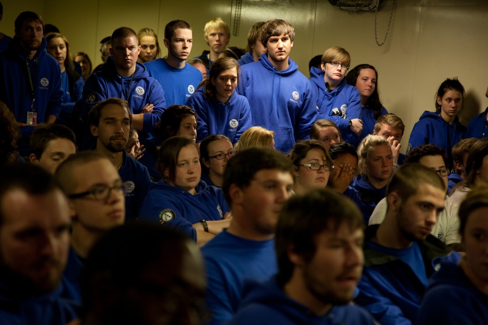 FEMA Corps Members listen to Serino