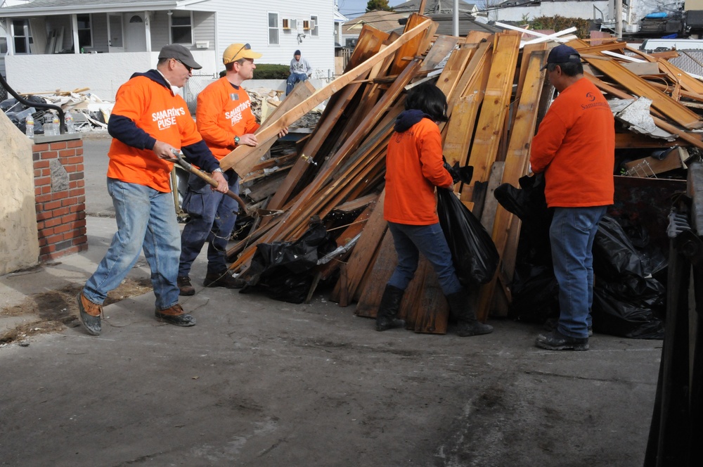 Volunteers help Hurricane Sandy survivors