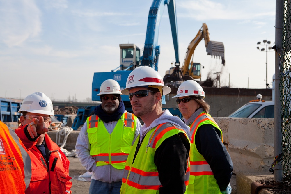 Staten Island debris being loaded on barges for transport and disposal