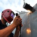 USS Mesa Verde sailors at work