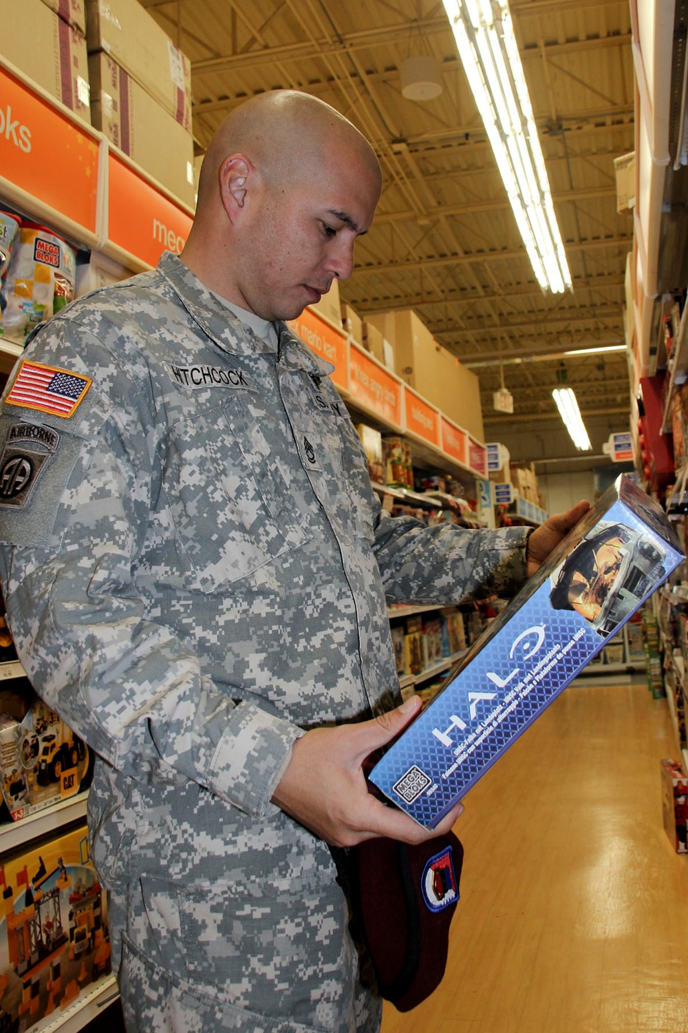 Paratrooper buys toy for donation