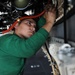 USS Nimitz sailor performs maintenance